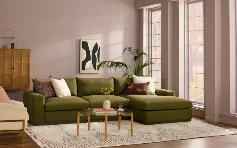 Green velvet modular sectional in the living room