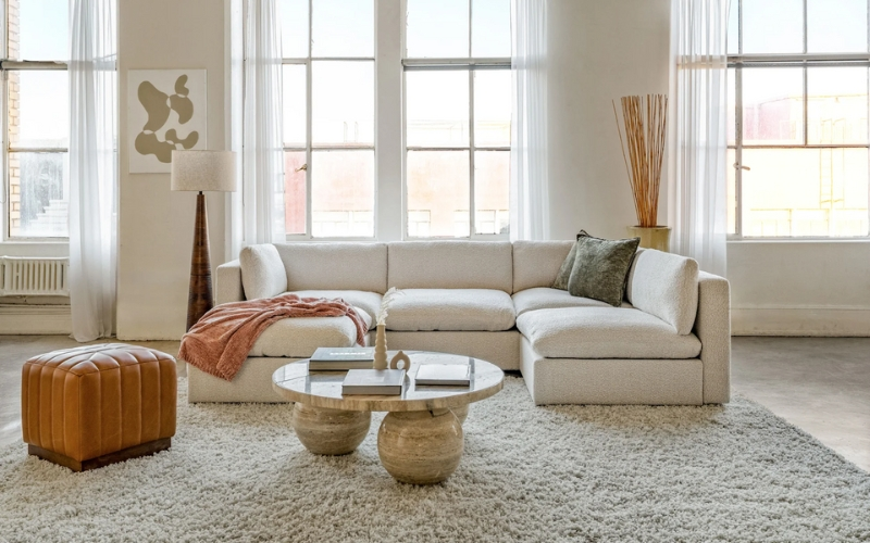 Deep seat sectional with storage ottoman